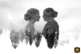 In Grand Teton National Park, Wyoming, an in-camera double-exposure creates a misty, silhouetted portrait of the wedding couple overlaid with the texture of the majestic mountain forest.